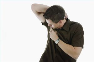 man_smelling_himself