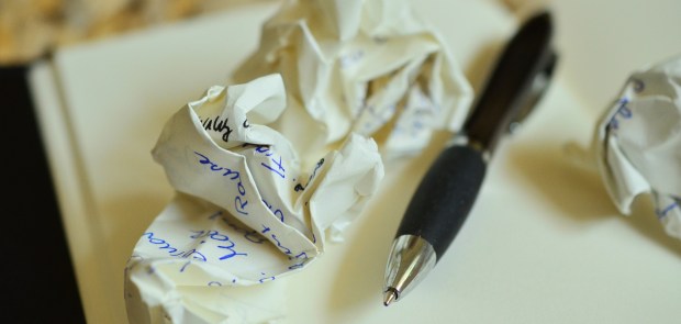 Notebook writing pen crumpled paper